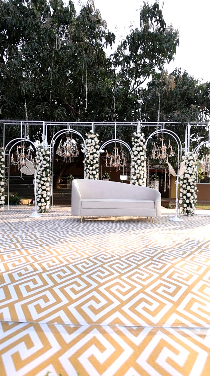 The couple's seat under the arches